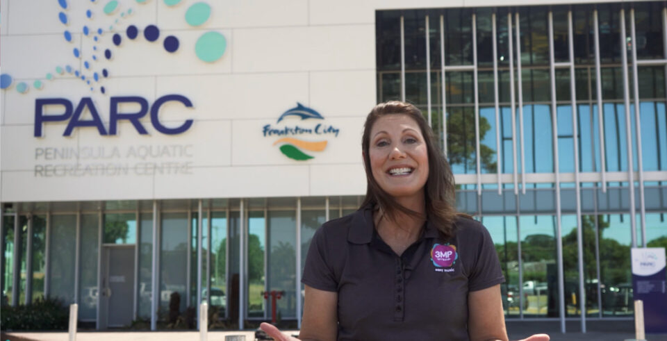 Woman standing in front of building